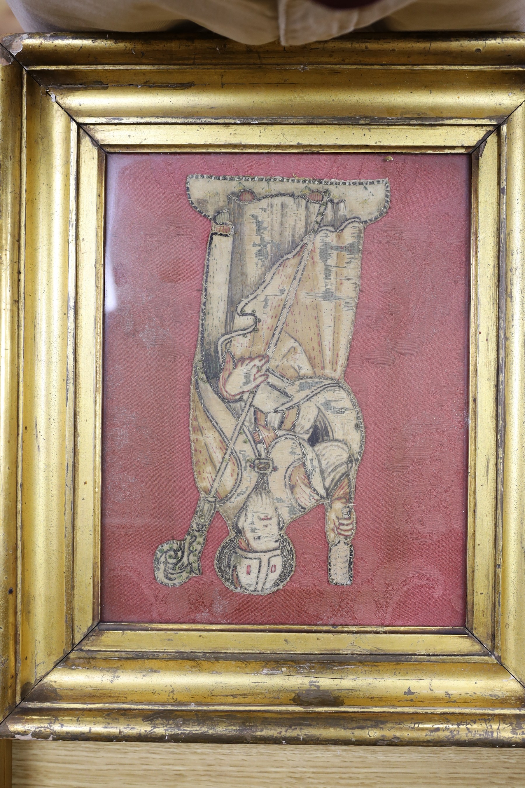 Two 18th century framed silk work religious panels and another later on canvas, largest 39 x 27cm